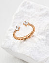 Minimally adjustable zircon ring