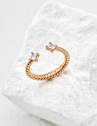 Minimally adjustable zircon ring