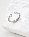 Minimally adjustable zircon ring